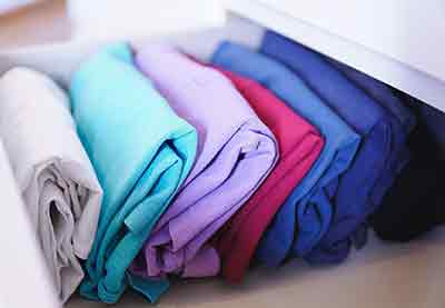 folded fabrics in a draw