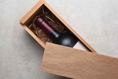 Clear Lacquered Wine Box, the lid is off and there is a bottle of wine showing inside