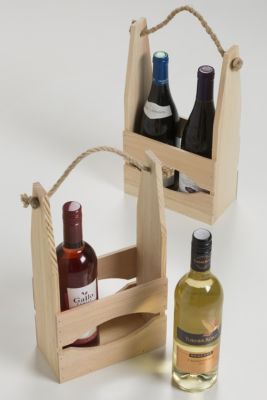 plain wooden racks with bottles of wine in them o a table, it has rope handles for carrying.