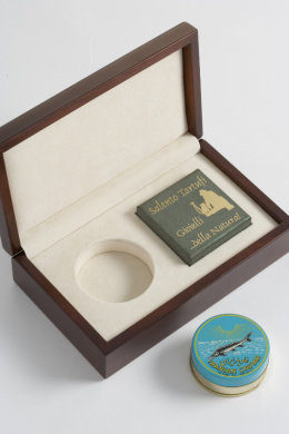 Wooden box with a tin of Caviar